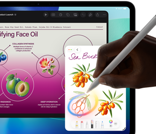 iPad Pro, écran face avant avec fond dégradé bleu foncé et vert et plusieurs apps ouvertes, main tenant un Apple Pencil Pro encerclant un croquis et illustrant la fonctionnalité baguette graphique d’Apple Intelligence
